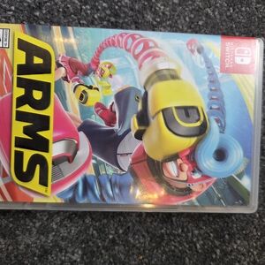 Nintendo ARMS Game with Yellow and Blue Highlights